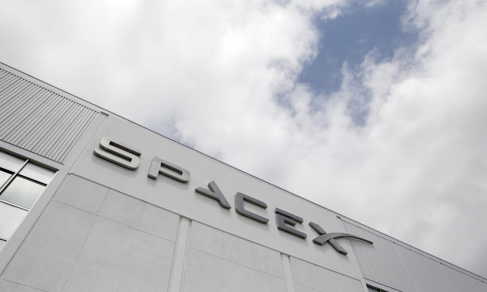 FILE - The SpaceX headquarters is seen, May 25, 2012, in Hawthorne, Calif. On Thursday, Aug. 24, 2023, the U.S. Department of Justice filed suit against SpaceX, the rocket company founded and run by Elon Musk, for alleged hiring discrimination against refugees and people seeking or already granted asylum. (AP Photo/Jae C. Hong, File)