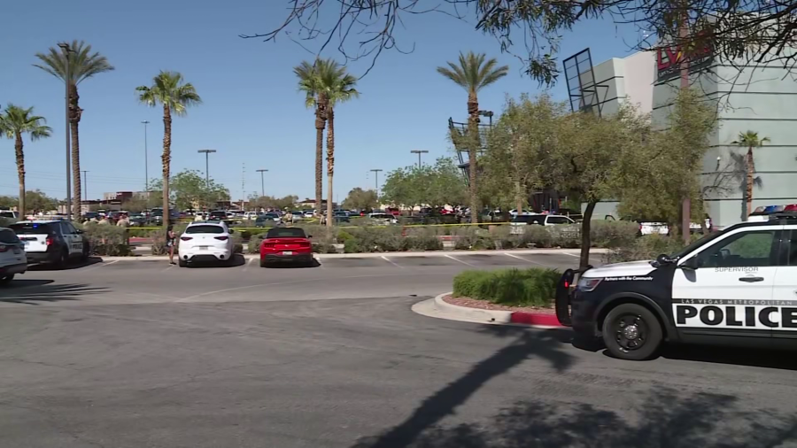 Las Vegas police take man into custody as they investigate shooting near Flamingo Road and 215 on Wednesday, May 1, 2024 (KLAS)