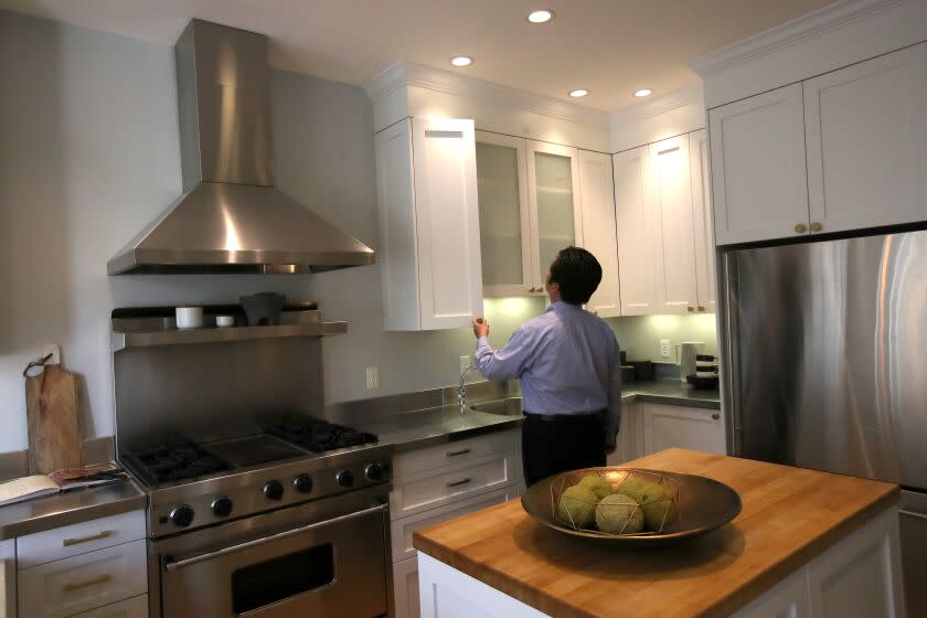 SAN FRANCISCO, CALIFORNIA - APRIL 16: A real estate agent tours a home for sale during a broker open house on April 16, 2019 in San Francisco, California. In the wake of several tech company IPOs, San Francisco is bracing for its already expensive real estate market to get even more expensive. Workers for companies that are debuting on the stock market could become millionaires overnight and look to spend their new wealth on property. (Photo by Justin Sullivan/Getty Images)