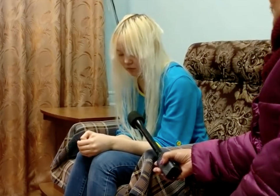 Darina, 20, being interviewed after she escaped from the house she had been allegedly imprisoned in by her mother.