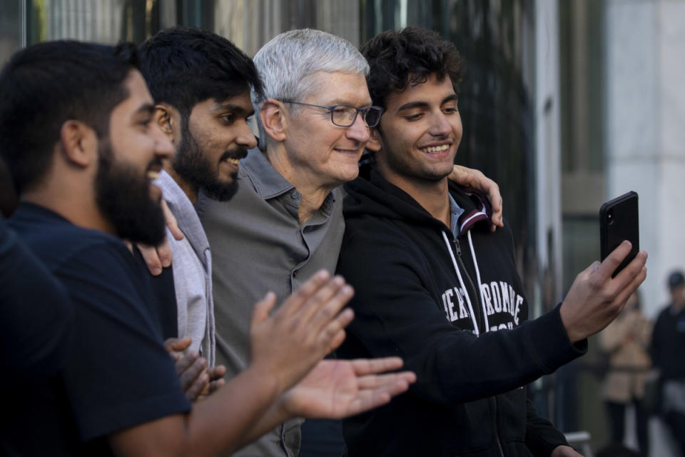 Apple CEO Tim Cook, faced with slowing domestic sales and an increasingly hostile regulatory environment, is looking to boost its fortunes in Asia. <p>Drew Angerer/Getty Images</p>