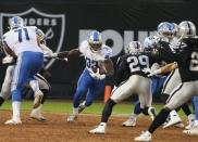 Aug 10, 2018; Oakland, CA, USA; Detroit Lions running back Kerryon Johnson (33) carries the ball against the Oakland Raiders during the first quarter at Oakland Coliseum. Mandatory Credit: Kelley L Cox-USA TODAY Sports