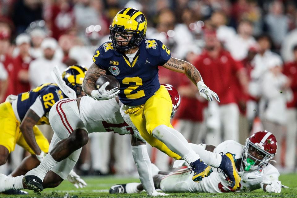 Michigan running back Blake Corum runs against the Alabama defense Monday at the 2024 Rose Bowl.