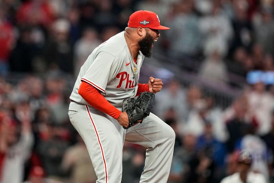 Philadelphia Phillies relief pitcher Jose Alvarado (46) reacts after sriking out Atlanta Braves' Orlando Arcia in the seventh inning of Game 2 of a baseball NL Division Series, Monday, Oct. 9, 2023, in Atlanta. (AP Photo/Brynn Anderson)