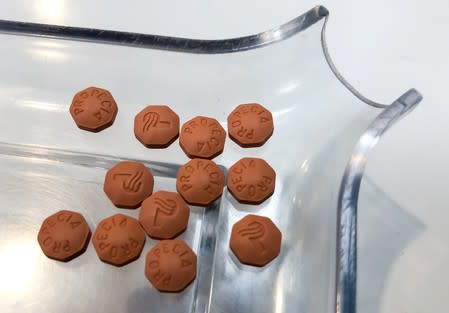 Propecia pills are seen on a tray in a pharmacy in New York