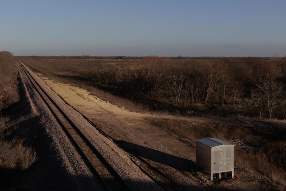A BNSF railroad runs through Gunter, TX on January 11, 2024. The land to the right of the railroad in this photo is owned by BNSF, where a plan for a 950 acre logistics center was approved by the Gunter City Council in May 2023 but then was cancelled following the reactions Gunter and Grayson County residents.