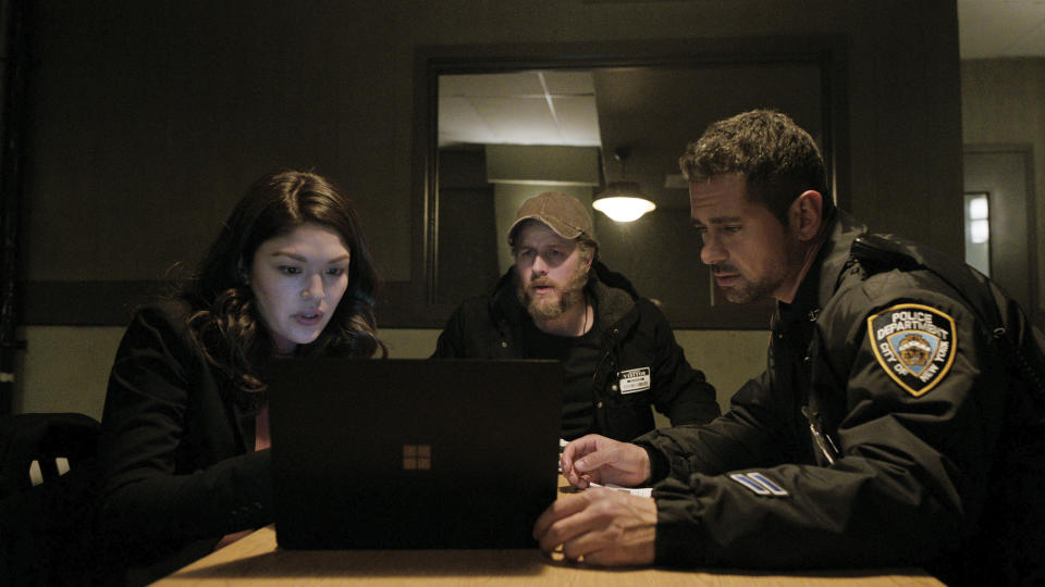 This image released by Netflix shows Ellen Tamaki, from left, Josh Dallas and J.R. Ramirez in a scene from" Manifest." Season four premieres on Nov. 4. (Netflix via AP)