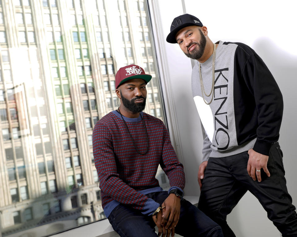 This March 19, 2019 photo shows Daniel Baker, better known as Desus Nice, left, and Joel Martinez, also known as The Kid Mero, during a portrait session in New York. The pair host the late night series "Desus & Mero," on Showtime. (Photo by Brian Ach/Invision/AP)