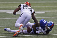 New York Giants tight end Evan Engram (88) fumbles the ball before Cincinnati Bengals strong safety Vonn Bell (24) recovers it during the first half of NFL football game, Sunday, Nov. 29, 2020, in Cincinnati. (AP Photo/Aaron Doster)