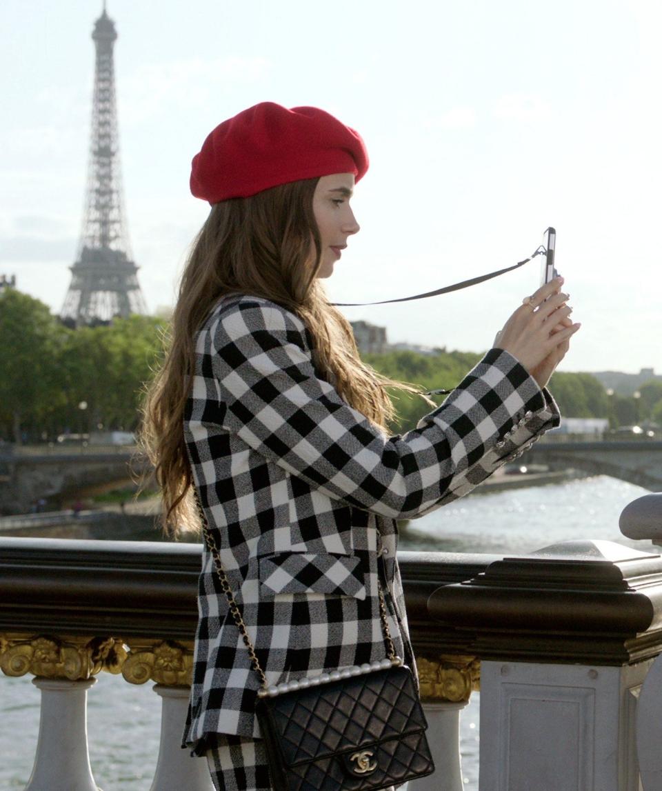 This look is kinda cute! Honestly, I'm jealous of anyone who can pull off a beret. The checkered coat is to die for, but the fact that it has matching shorts is a little amusing. A thigh-high pencil skirt would work better, in my humble opinion.