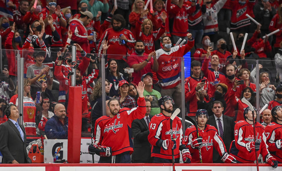 WASHINGTON , DC - OCTOBER 13: Washington Capitals left wing Alex Ovechkin (8) waves to the crowd after he scored and advanced to number 5 on the all-time NHL scoring list during action against the New York Rangers at Capital One Arena. (Photo by Jonathan Newton/The Washington Post via Getty Images)