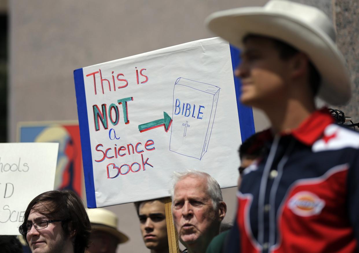 The State Board of Education approved a swath of science textbooks Friday to be used for instruction in Texas classrooms after requesting some content changes. In this file photo, pro-science supporters rallied prior to a SBOE public hearing on proposed new science textbooks.