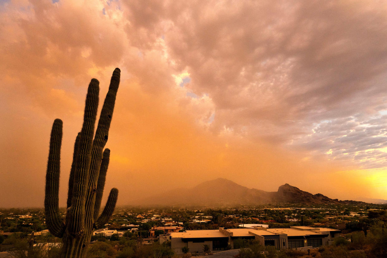 A dust storm rolls over Camelback Mountain near Phoenix.