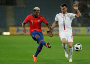 Soccer Football - International Friendly - Serbia vs Chile - Merkur-Arena, Graz, Austria - June 4, 2018 Chile’s Junior Fernandes in action with Serbia’s Filip Kostic REUTERS/Heinz-Peter Bader