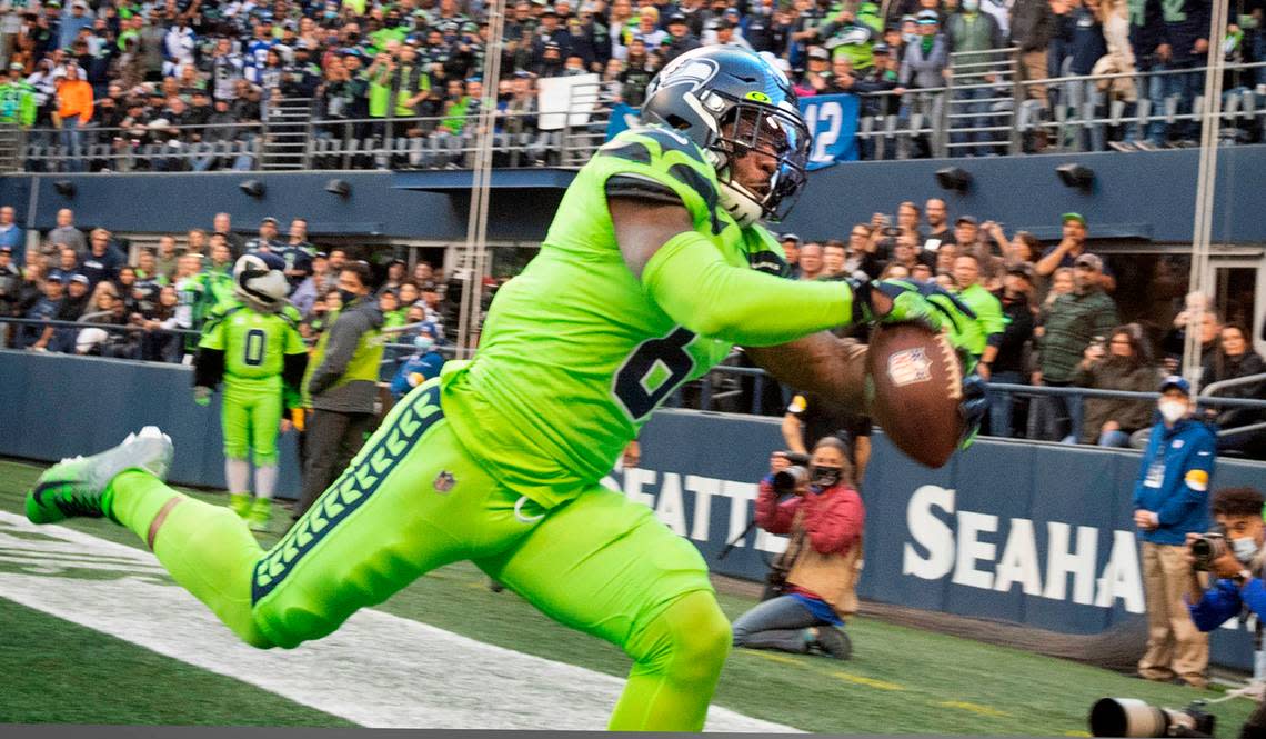 Seattle free safety Quandre Diggs intercepts a Los Angeles Rams pass in the back of the end zone during the NFL’s Thursday Night Football game at Lumen Field in Seattle, Washington, on Oct. 7, 2021.