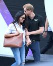 <p>Prince Harry and Meghan Markle couldn't keep their hands off each other as they attended a sporting event on day three of the Invictus Games Toronto 2017 in September. </p>