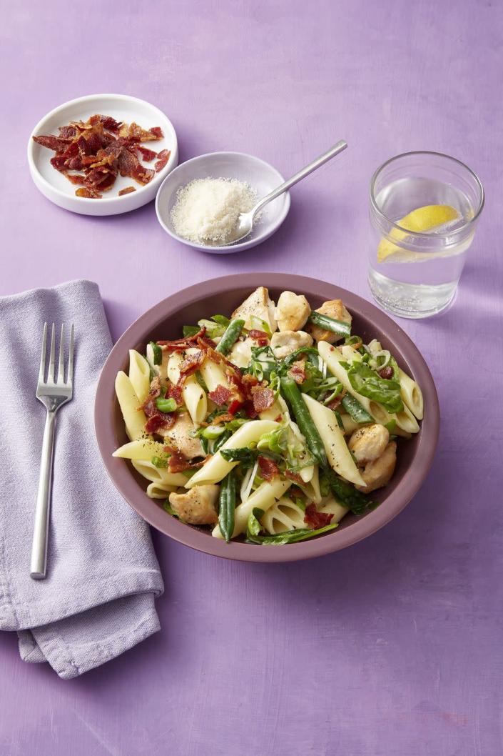 <p>Who needs meatballs when you have bacon?</p><p><em><a href="https://www.womansday.com/food-recipes/food-drinks/a19133143/chicken-green-bean-and-bacon-pasta-recipe/" rel="nofollow noopener" target="_blank" data-ylk="slk:Get the Chicken, Green Bean, and Bacon Pasta recipe." class="link ">Get the Chicken, Green Bean, and Bacon Pasta recipe.</a></em></p>