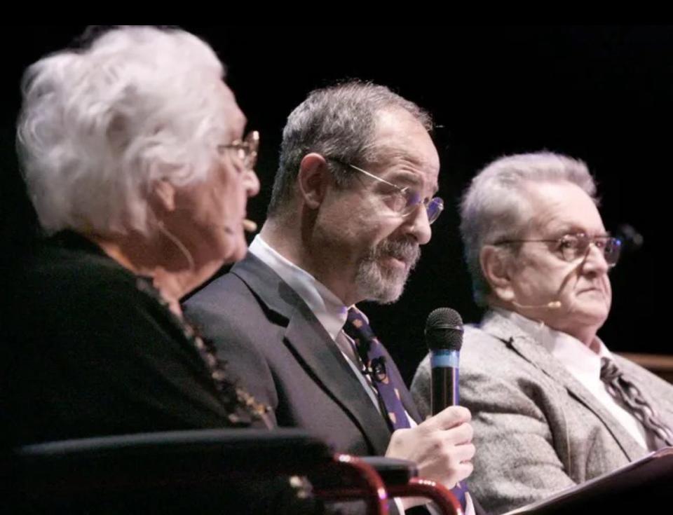 Ted Gup, center, a journalist and former Canton resident, published a book in 2010, "A Secret Gift: How One Man's Kindness -- and a Trove of Letters -- Revealed the Hidden History of the Great Depression." He appeared at an event at the Palace Theater in 2010 to celebrate the publishing of his book.