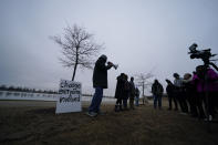 Rev. Andre Johnson of the Gifts of Life Ministries speaks to a group of demonstrators who gathered at dusk in Shelby Farms Park on Monday, Jan. 30, 2023, in Memphis, Tenn., in response to the death of Tyre Nichols, who died after being beaten by Memphis police officers. Nichols, who had a hobby in photography, frequented the park to photograph sunsets. (AP Photo/Gerald Herbert)