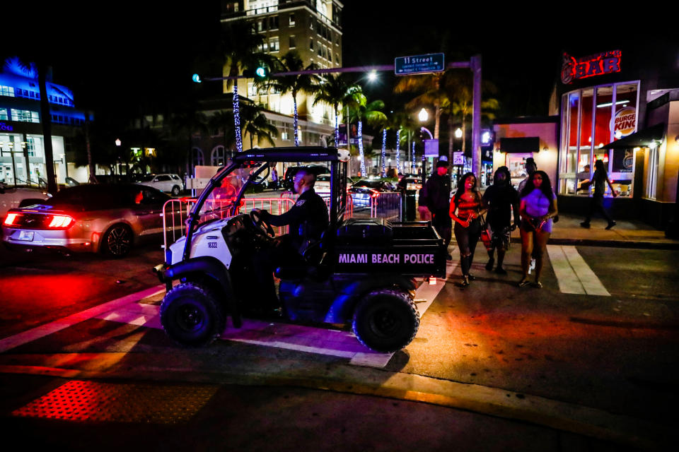 A Miami Beach Police officer exits a closed road during spring break on March 24, 2022. (Eva Marie Uzcategui / AFP via Getty Images file)