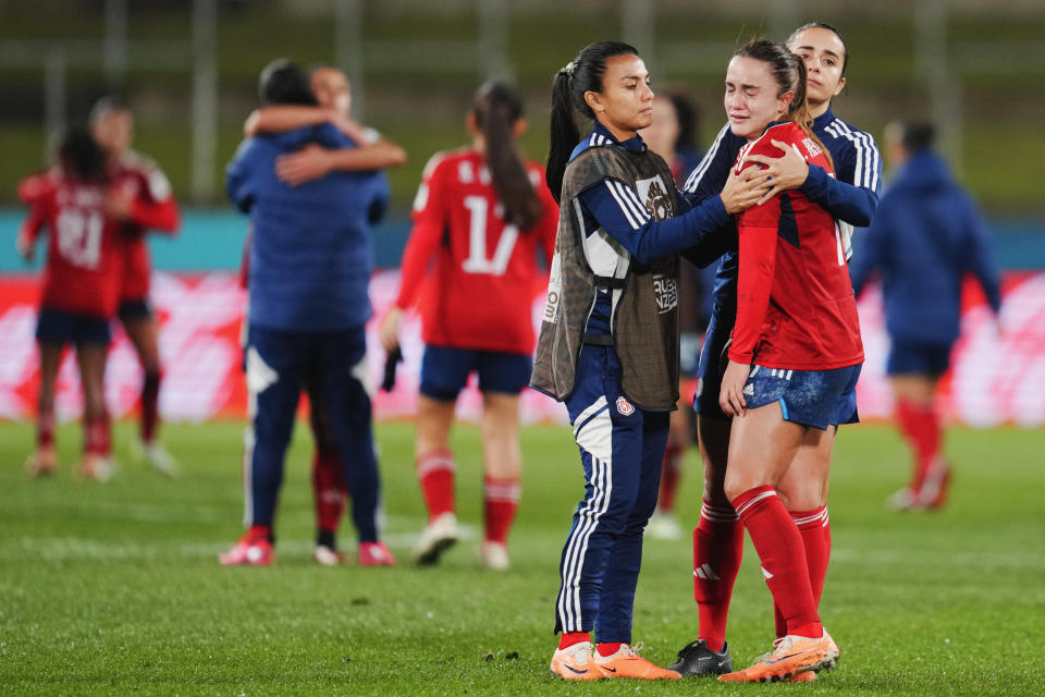 Costa Rica's Melissa Herrera is consoled by teammates following the Women's World Cup Group C soccer match between Costa Rica and Zambia in Hamilton, New Zealand, Monday, July 31, 2023. (AP Photo/Abbie Parr)