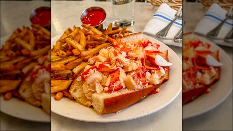 Lobster roll with fries served at Neptune