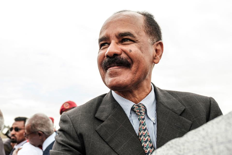 Eritrea's President Isaias Afwerki smiles upon his arrival at the airport in Gondar, for a visit in Ethiopia, on November 9, 2018. (Photo by EDUARDO SOTERAS / AFP)        (Photo credit should read EDUARDO SOTERAS/AFP via Getty Images)