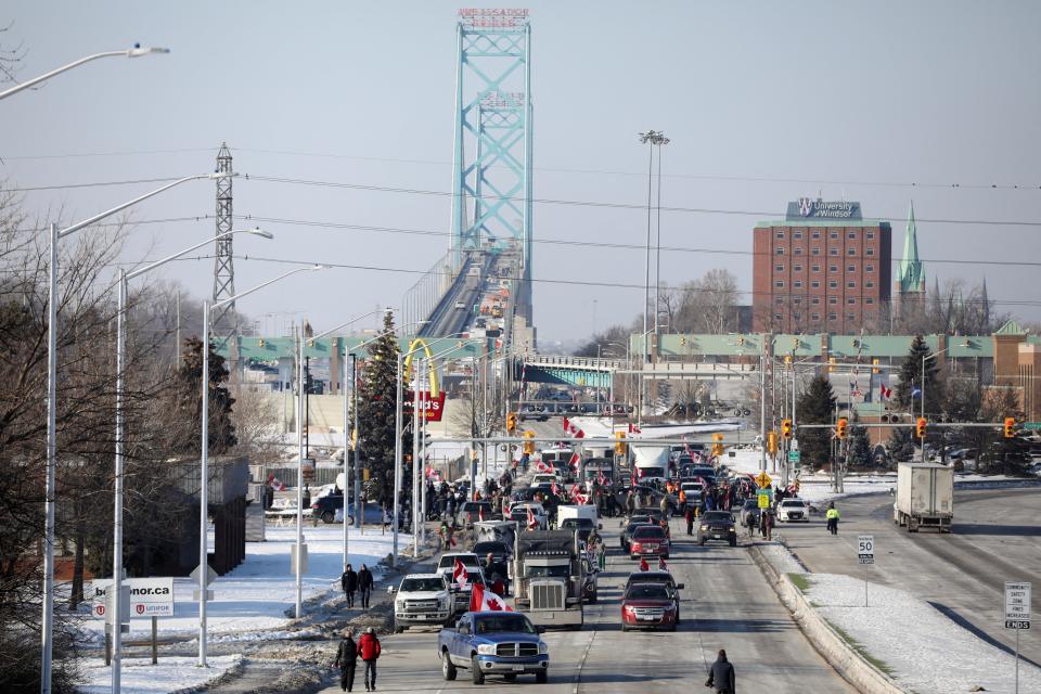 (FILE) Vehicles block the route leading from the Ambassador Bridge that links Detroit and Windsor (REUTERS)