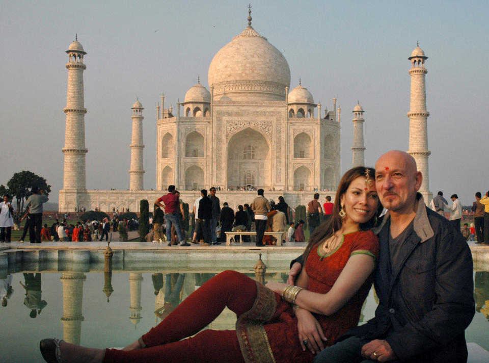 Hollywood veteran Ben Kingsley, who played the role of Mohandas Gandhi in the film 'Gandhi', poses with his wife Daniela Lavender in front of the historic Taj Mahal monument in Agra on December 2, 2009.   (STR/AFP/Getty Images)