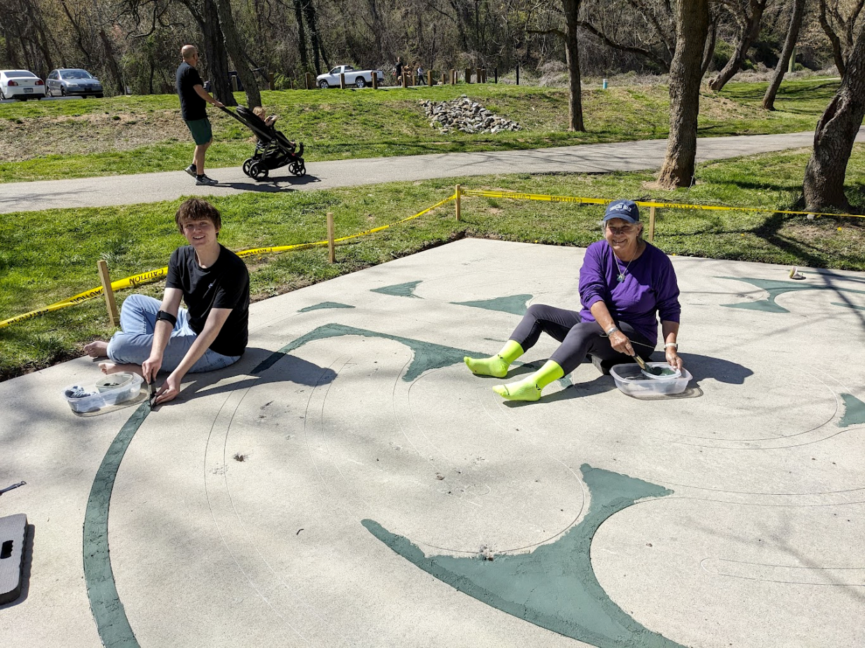 Charlie Haden (left) and Marie Pickle (right) were on the artist team with Robert Haden and Chuck Hunner to create the labyrinth in the French Broad River Park in Asheville.