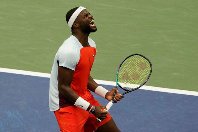 Frances Tiafoe reacts with joy to his victory over Andrey Rublev 