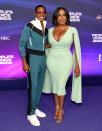 <p>Niecy Nash and Jessica Betts have a matchy-matchy moment on the purple carpet. The couple coordinate their green outfits, with Nash wearing a body-hugging light green dress and Betts opting for a rich shade of green in her tracksuit. </p>