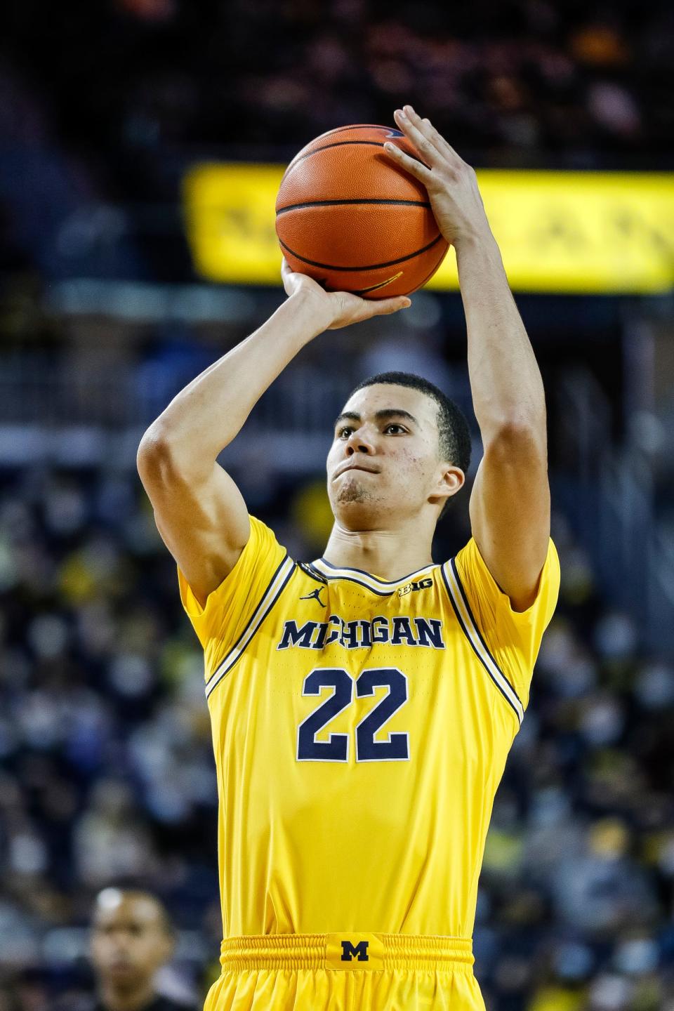 Michigan forward Caleb Houstan (22) attempts a free throw against Rutgers during the second half at the Crisler Center in Ann Arbor on Wednesday, Feb. 23, 2022.