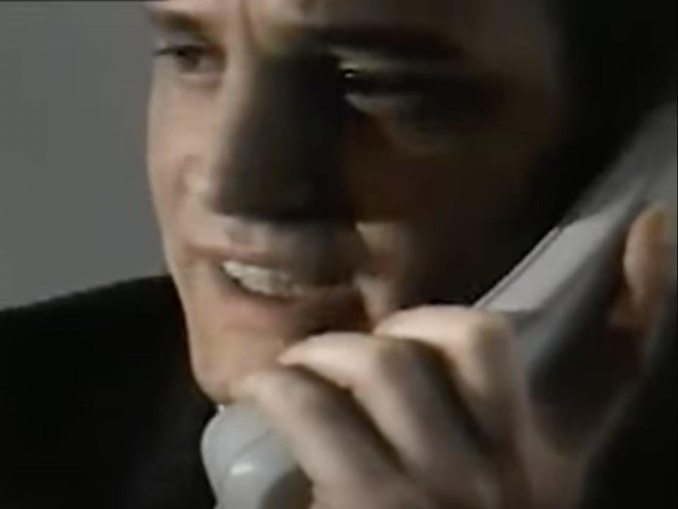 Colin Firth on the telephone.