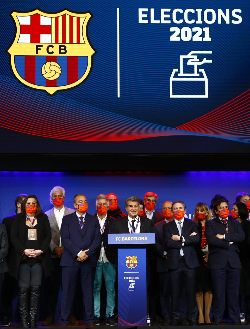 Joan Laporta, centre, celebrates his victory after elections at the Camp Nou stadium in Barcelona, Spain, Sunday, March 7, 2021. Joan Laporta has been elected Barcelona's president on Sunday, inheriting a club mired in debt and facing daunting problems that include the possible departure of Messi when his contract ends at the end of the season. (AP Photo/Joan Monfort)