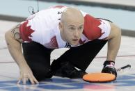 Canada's vice Ryan Fry reacts during their men's curling round robin game against the U.S. in the Ice Cube Curling Centre at the Sochi 2014 Winter Olympic Games February 16, 2014. REUTERS/Ints Kalnins (RUSSIA - Tags: SPORT OLYMPICS SPORT CURLING)