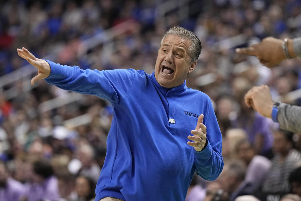 Kentucky head coach John Calipari yells during the first half of a second-round college basketball game against Kansas State in the NCAA Tournament on Sunday, March 19, 2023, in Greensboro, N.C. (AP Photo/Chris Carlson)