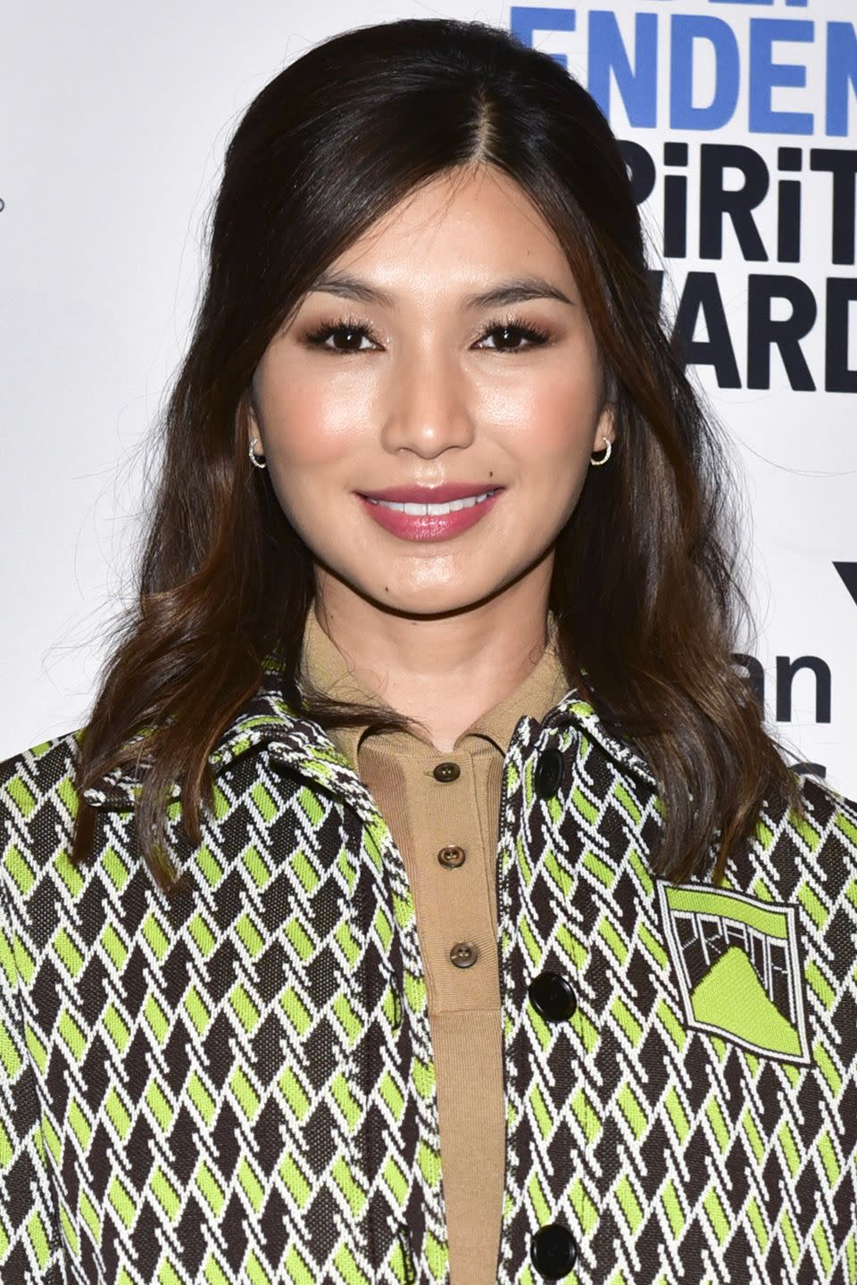 <p>For medium hair length, follow Gemma Chan's lead and part hair to the side before gathering some layers for a half-up, half-down style. Subtle waves give the style both volume and hold.</p>