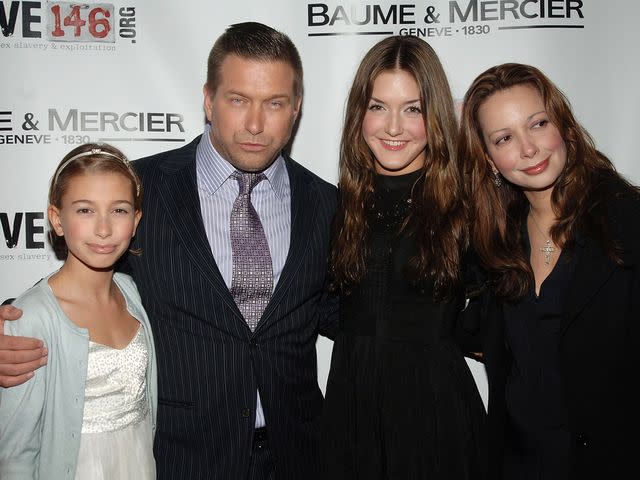 <p>Duffy-Marie Arnoult/WireImage</p> Hailey Baldwin, Stephen Baldwin, Alaia Baldwin, and Kennya Baldwin attend the "Into the Light" exhibition opening in 2008