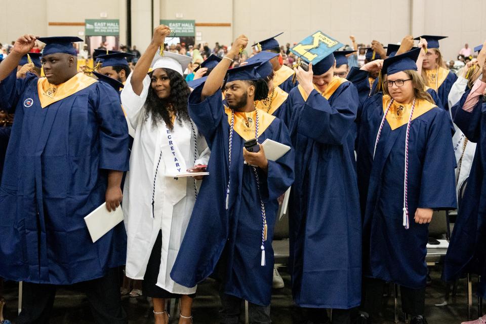 Academy @ Shawnee Class of 2024 Graduates move their tassels after officially graduating on Friday, May 24, 2024 at the Kentucky Expo Center.
