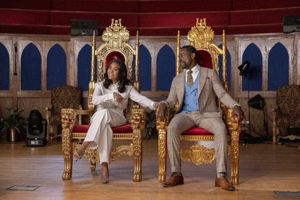 This image released by Focus Features shows Regina Hall, left, and Sterling K. Brown in "Honk for Jesus. Save Your Soul." (Steve Swisher/Focus Features via AP)