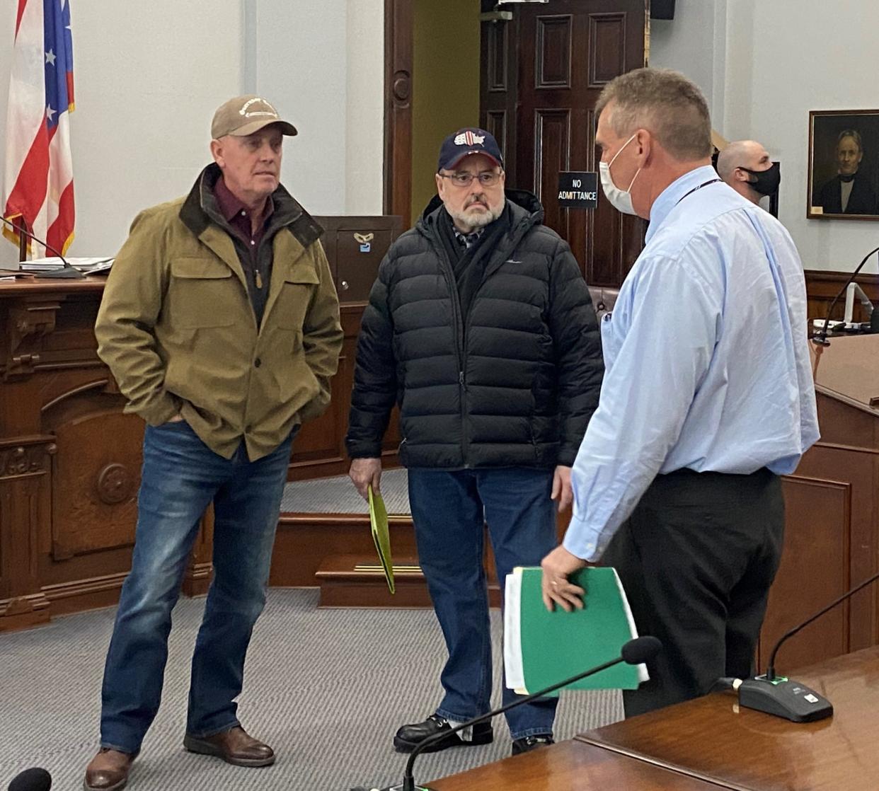 Guernsey County Common Pleas Court Judge Daniel G. Padden, right, discussed on-going and future renovation plans at the Guernsey County Courthouse with commissioners Jack Marlin, left, and Dave Wilson, on Tuesday. The Adult Probation Department is undergoing renovations while future work in the Juvenile Probation Department, courtroom and jury room were discussed.