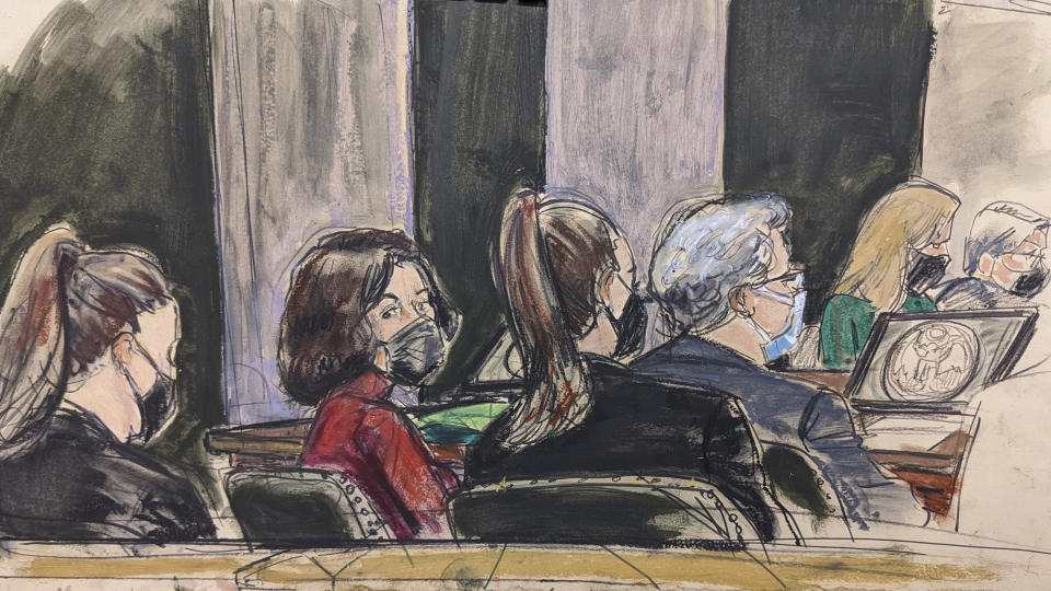 This courtroom sketch shows Ghislaine Maxwell seated at defense table in red. Source: AP