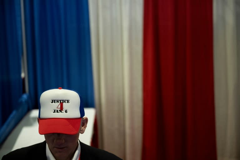 A man at a Republican event in Maryland on February 22, 2024, wears a cap to show support for people sentenced to jail for their roles in the January 6, 2021, occupation of the US Capitol (Brendan Smialowski)