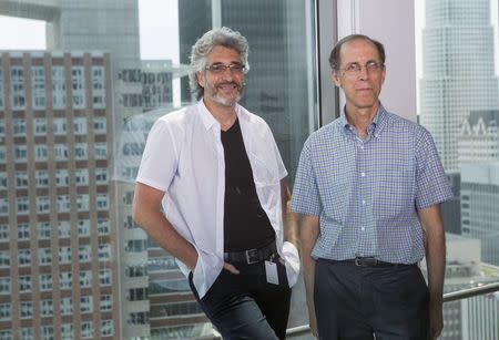 Director Michael Rossato-Bennett (L) and social worker Dan Cohen pose for a portrait while promoting the documentary "Alive Inside" in Los Angeles, California July 29, 2014. REUTERS/Mario Anzuoni