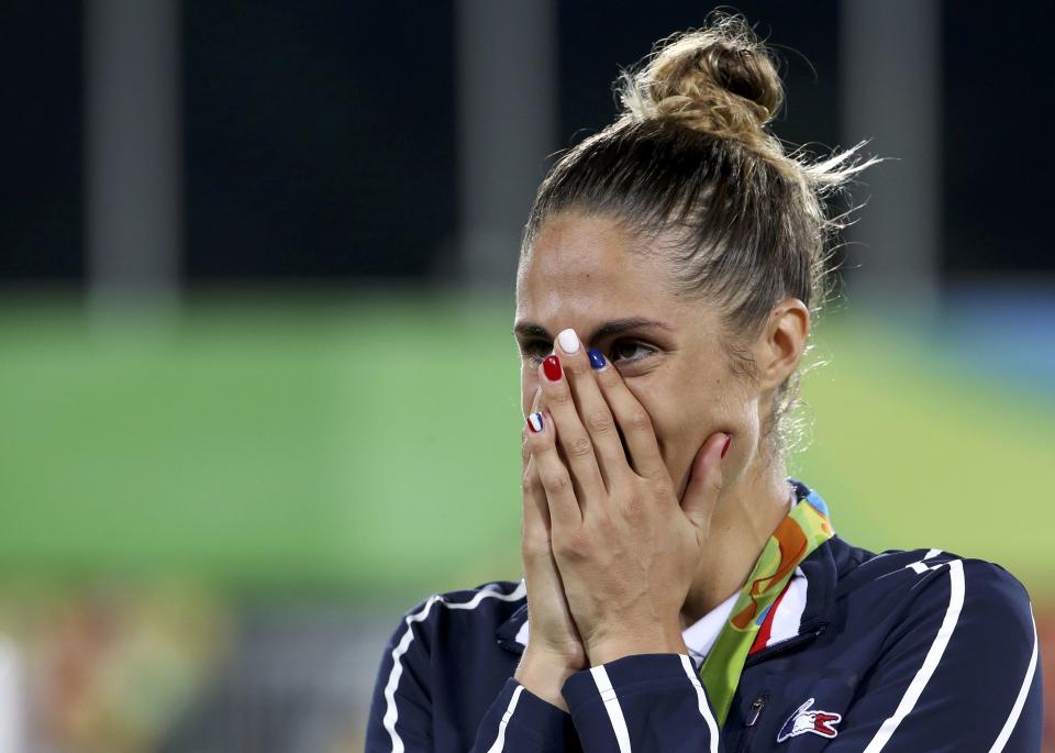 2016 Rio Olympics - Modern Pentathlon - Victory Ceremony - Women's Victory Ceremony - Deodoro Stadium - Rio de Janeiro, Brazil - 19/08/2016. Silver medalist Elodie Clouvel (FRA) of France reacts. REUTERS/Edgard Garrido  FOR EDITORIAL USE ONLY. NOT FOR SALE FOR MARKETING OR ADVERTISING CAMPAIGNS.  