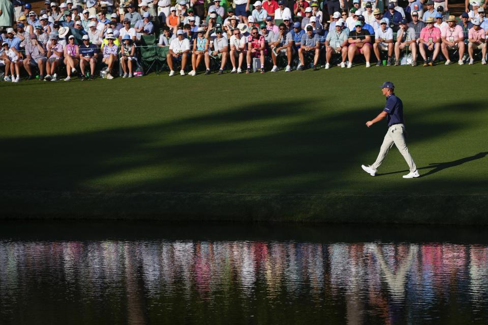 Bryson DeChambeau walks to the green on the 16th hole during final round at the Masters golf tournament at Augusta National Golf Club Sunday, April 14, 2024, in Augusta, Ga. (AP Photo/Matt Slocum)