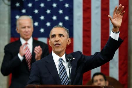 U.S. President Barack Obama waves at the conclusion of his final State of the Union address to a joint session of Congress in Washington January 12, 2016. REUTERS/Evan Vucci/Pool