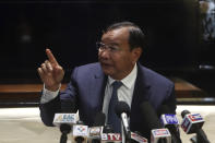 Cambodian Foreign Minister Prak Sokhonn speaks during a press conference upon his arrival from Myanmar, at Phnom Penh International Airport, in Phnom Penh, Cambodia, Saturday, Jan. 8, 2022. Prime Minister Hun Sen's visit to Myanmar seeking to revive peace efforts after last year's military takeover has provoked an angry backlash among critics, who say he is legitimizing the army's seizure of power. (AP Photo/Heng Sinith)