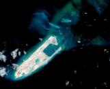 Beijing has built a runway on the Fiery Cross Reef, which is also claimed by Vietnam and the Philippines